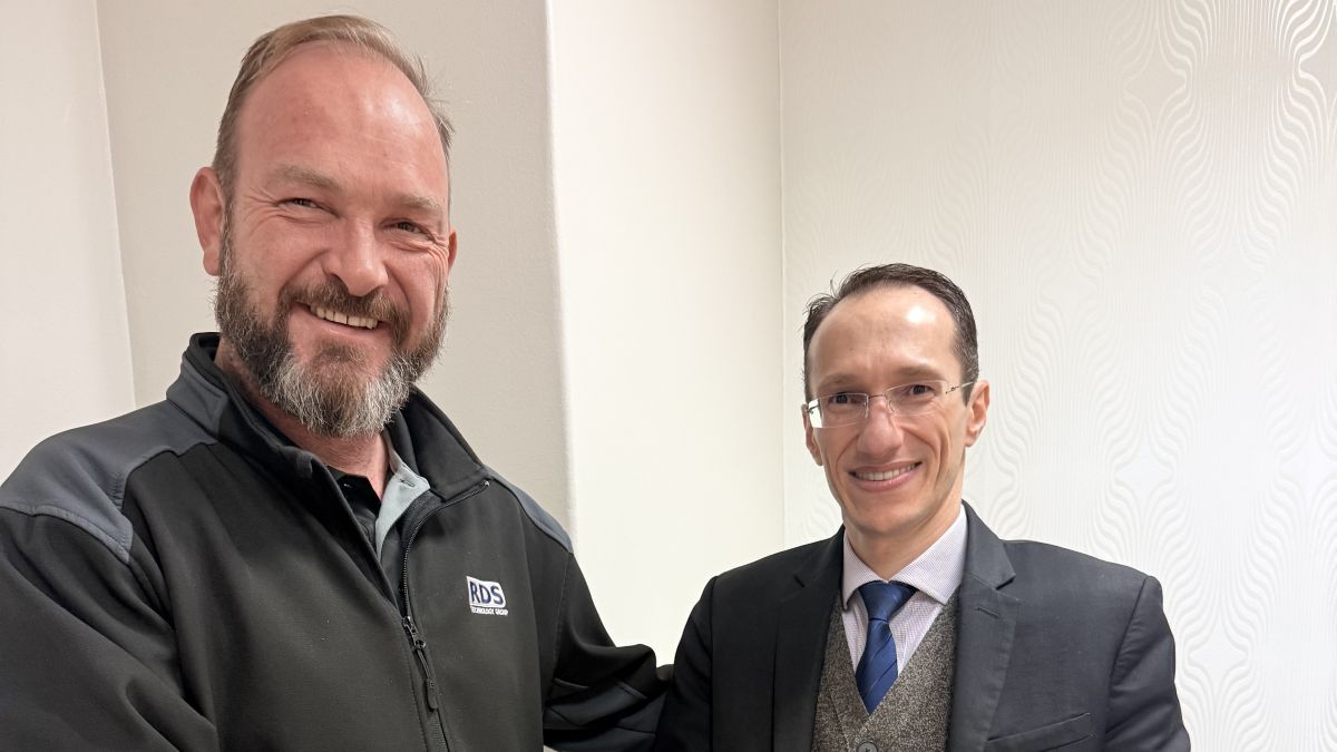 IT Support company - Johannesburg | Pretoria | Cape Town 9 Wilhem Dubber and Pastor Clodoaldo Leandro Milesi shaking hands.